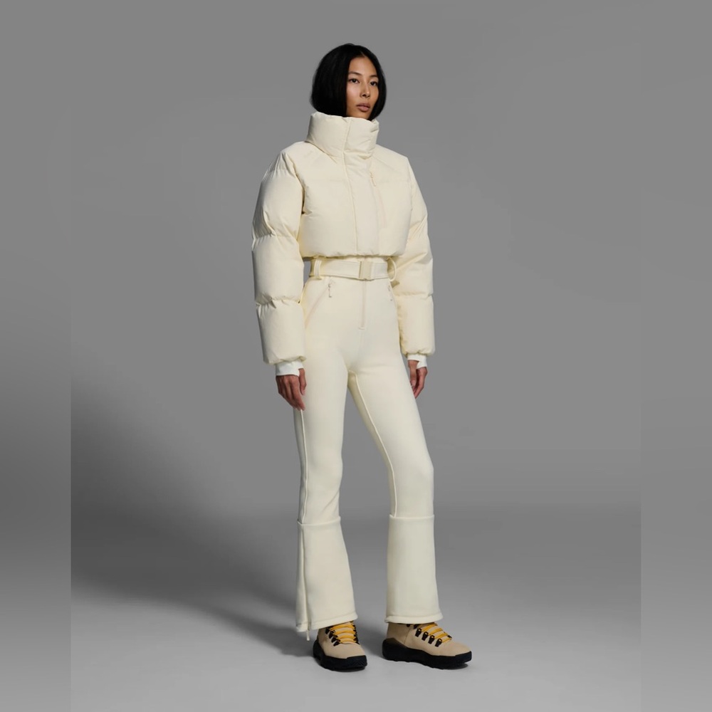 Cordova - Cream Myoko ski suit Flared Jumpsuit with Belted Puffer Jacket